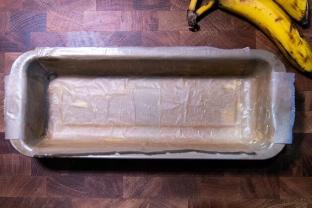 A 13 x 5-inch loaf pan lined with parchment paper and lightly greased.